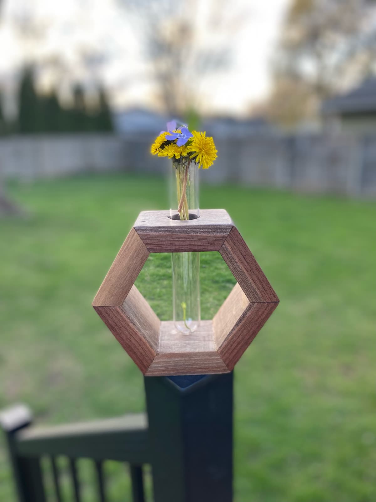 Tree-stump candle holder with carved flame